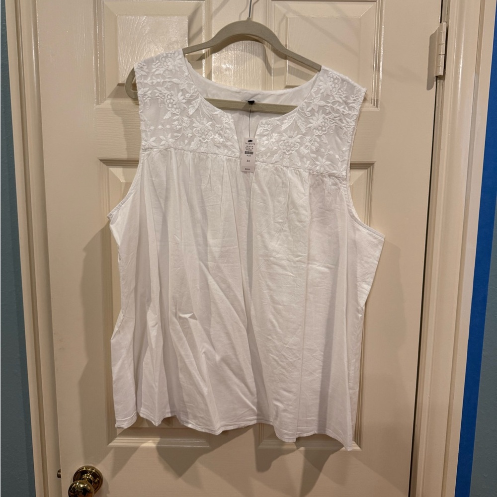 White Sleeveless Top with Embroidered Flower Detail